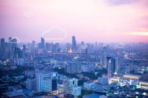 Bluechip Solutions Saudi Arabia's graphic City skyline with cloud and Wi-Fi icons.